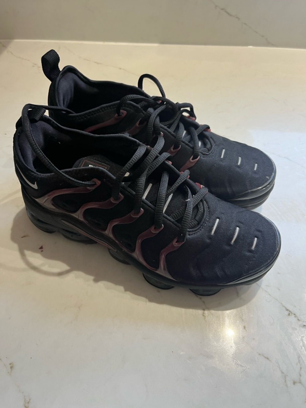 Nike Black Sneakers with Plum Accent Wave Detailing